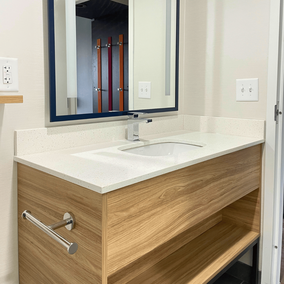 Tru By Hilton bathroom vanity with modern fixtures