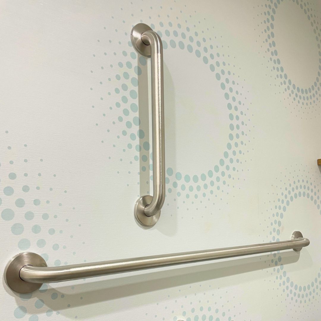 Tru By Hilton shower surround installation