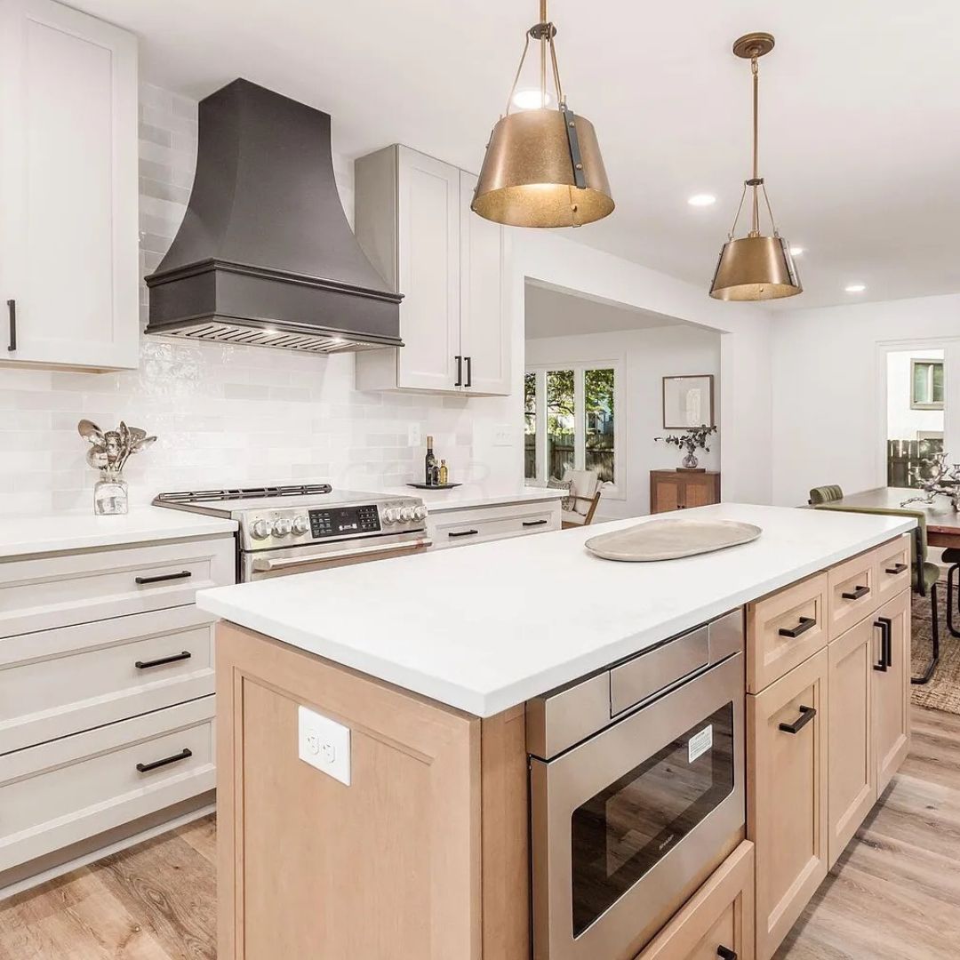 Evans Farm townhouse kitchen with custom island and white cabinetry