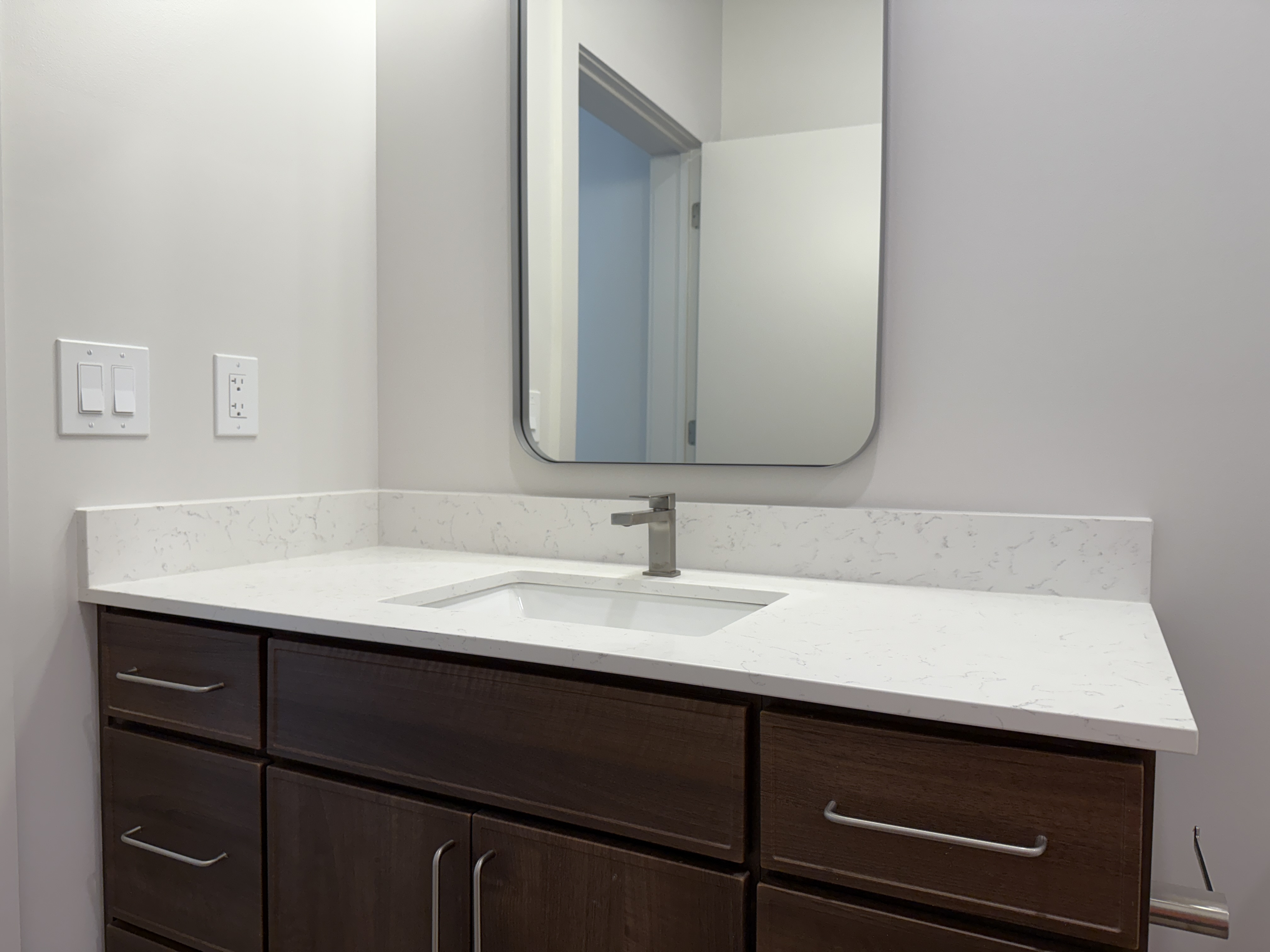 The Arc student housing bathroom vanity installation