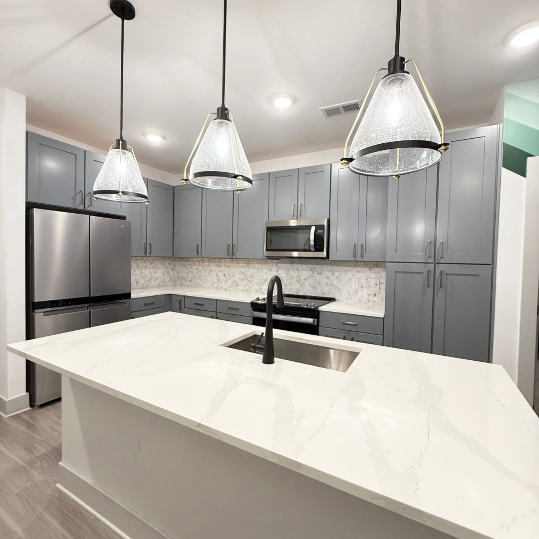 Tropia luxury kitchen with gray cabinets and island